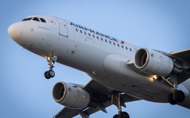 white passenger plane in the sky during daytime